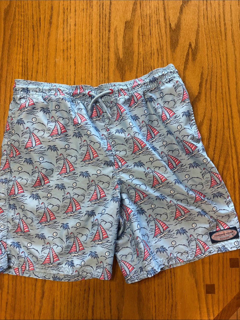 Vineyard Vines Light Blue Sailboat Print Swim Trunks with Red Accents